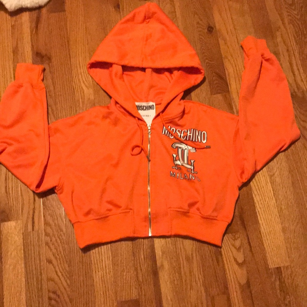 A orange moschino jacket